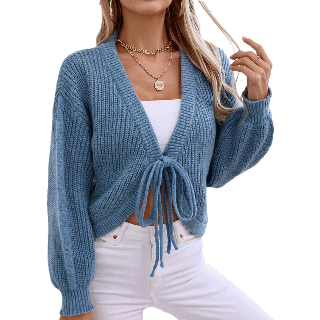 Damen Strickjacke mit voluminösen Ärmeln und dekorativen Bindebändern EB