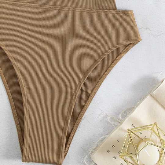 Damen Einteiler Badeanzug mit elegantem Schnitt und seitlichen Riemen EB