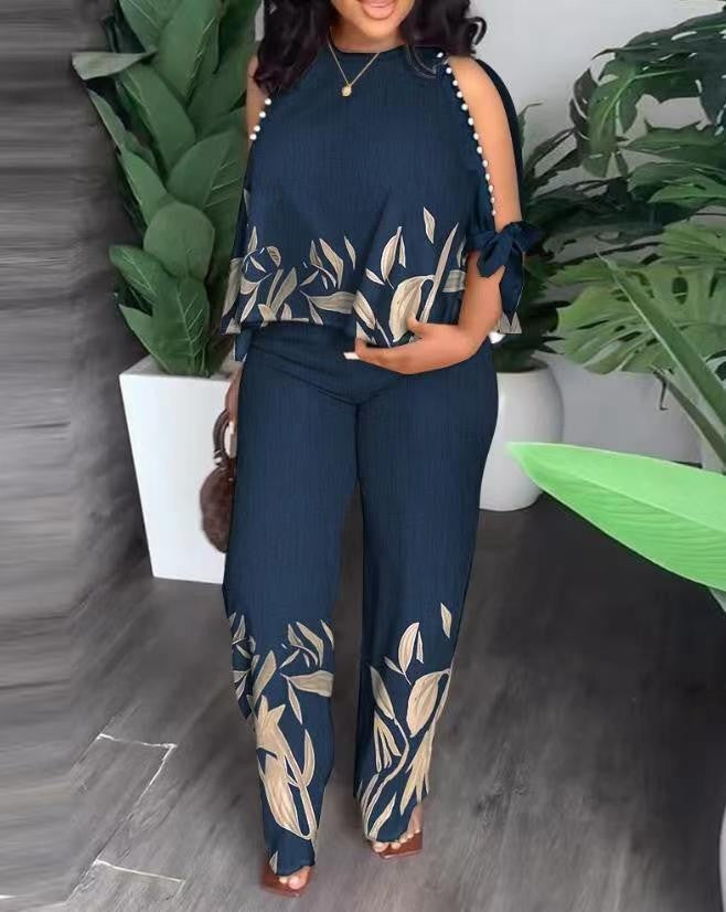 Damen Elegant gestaltetes Sommeroutfit mit floralem Design und Schulterfreiem Oberteil EB