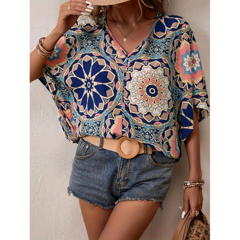 Damen Oversized Bluse mit kontrastvollem Blumenmuster EB