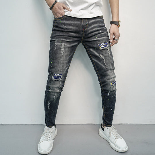 Herren Skinny Fit Jeans im kreativen Rissdesign und bunten Farbsklecks EB