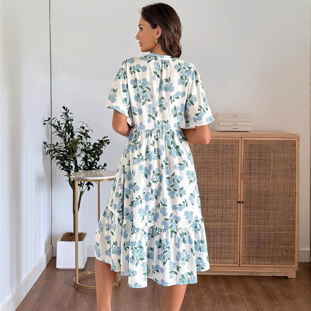 Damen Midikleid mit frischem Blumenmuster und voluminösem Rock EB