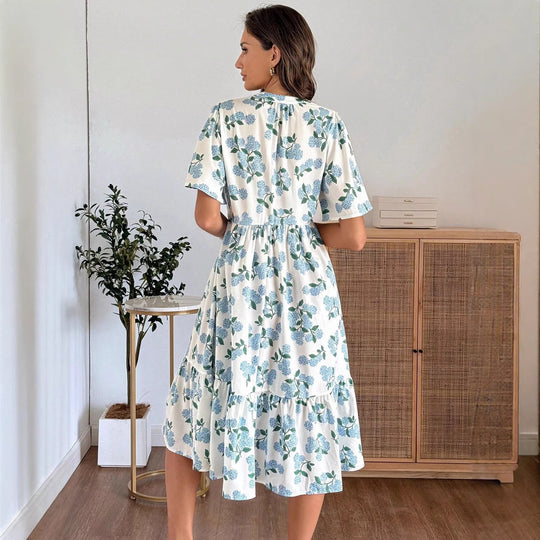Damen Midikleid mit frischem Blumenmuster und voluminösem Rock EB