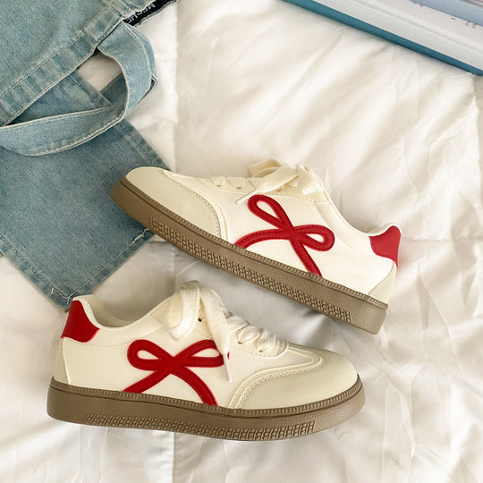 Damen Sneakers mit verspieltem Schleifen-Design und bequemer Sohle EB