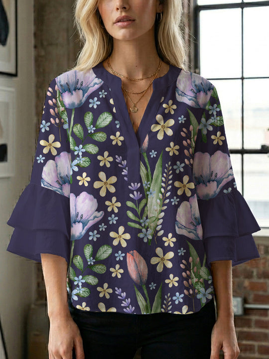Damen Bluse mit voluminösen Ärmeln und floralem Design EB