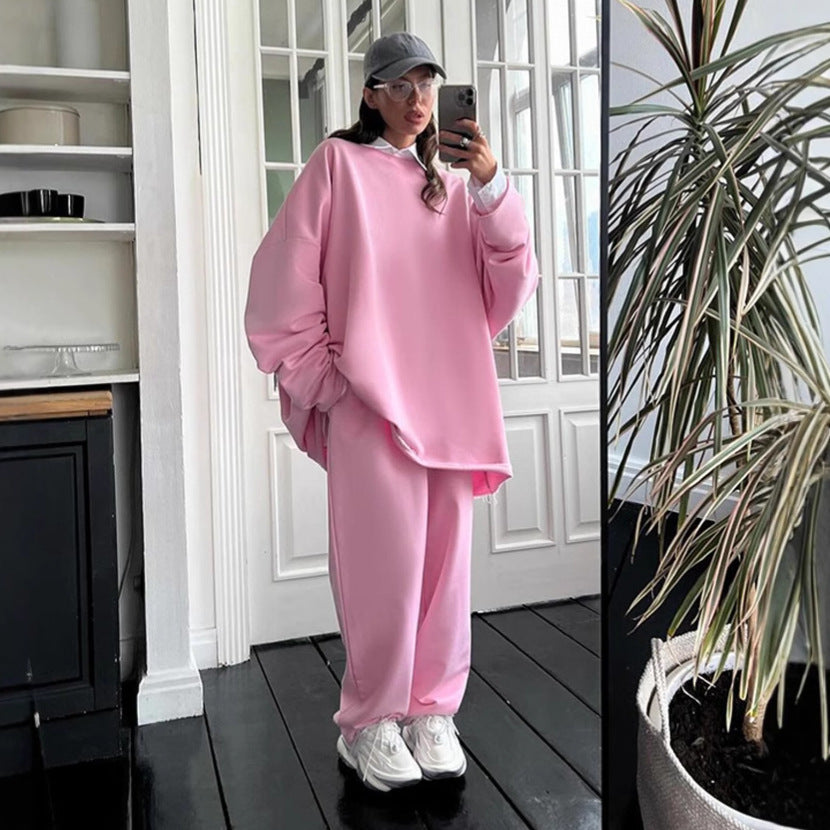 Damen oversized Lounge-Set mit ausgefranstem Saum, extra langem Sweatpullover und weiter hochgeschnittener Jogginghose EB