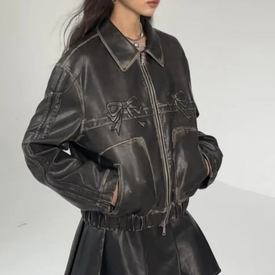 Damen Kunstlederjacke mit Rüschen und elastischem Saum EB