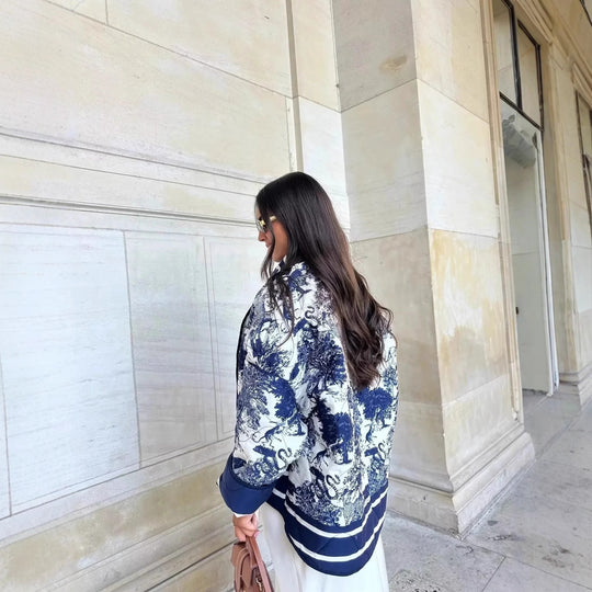 Damen Steppjacke mit floralem Design und eleganten Taschen EB