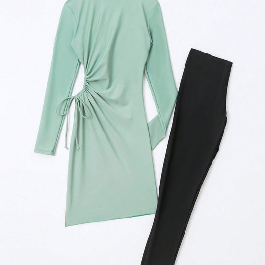 Damen modisches Strandoutfit mit längerem Oberteil EB