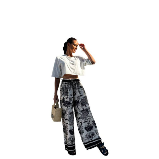 Damen Weite Sommerhose mit floralem Muster und elastischem Bund EB