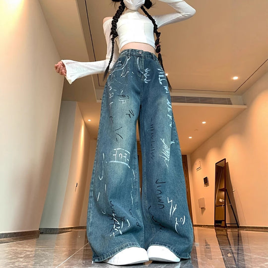 Damen Weite Jeanshose mit kreativem Graffiti-Design EB