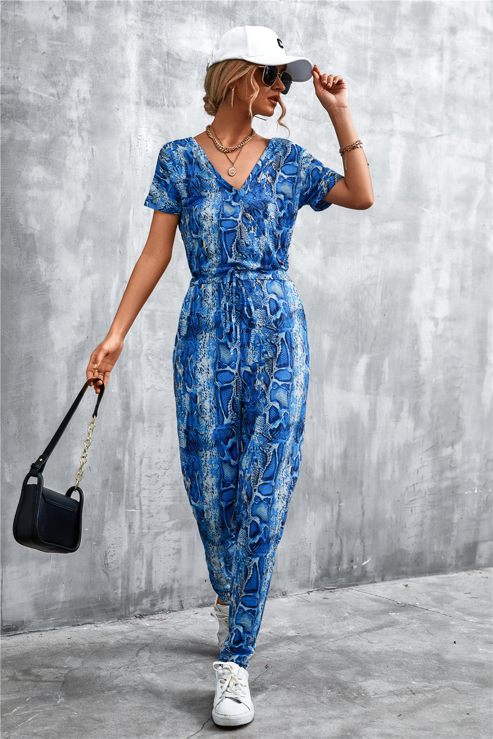 Damen elegante Jumpsuit im Snake-Print-Stil mit Taillengürtel und V-Ausschnitt EB