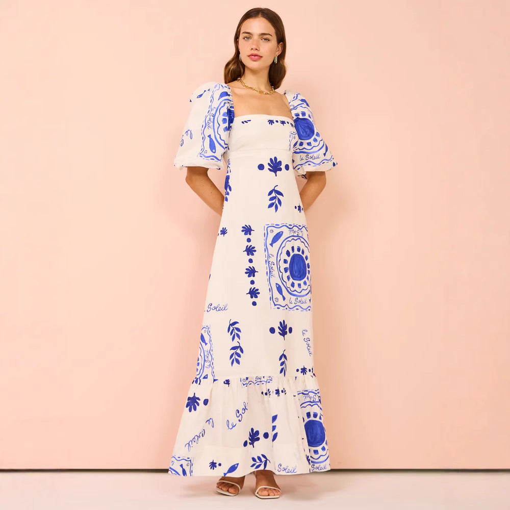 Damen Maxikleid mit eleganten Puffärmeln und floralen Akzenten EB