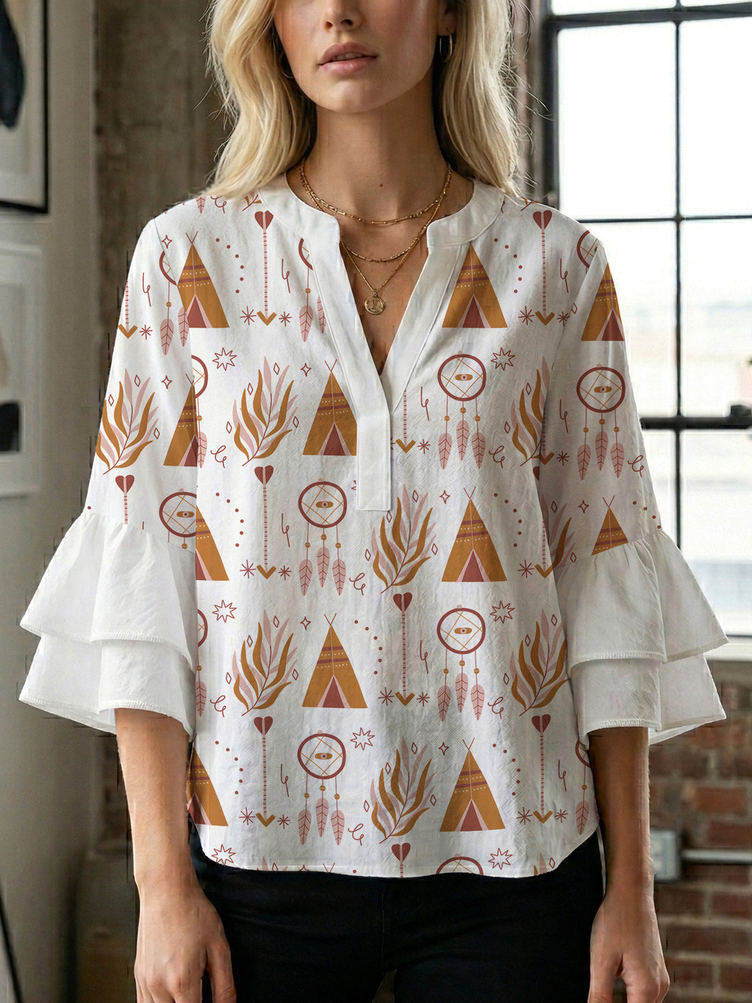 Damen Bluse mit voluminösen Rüschenärmeln und modernem Motiv EB
