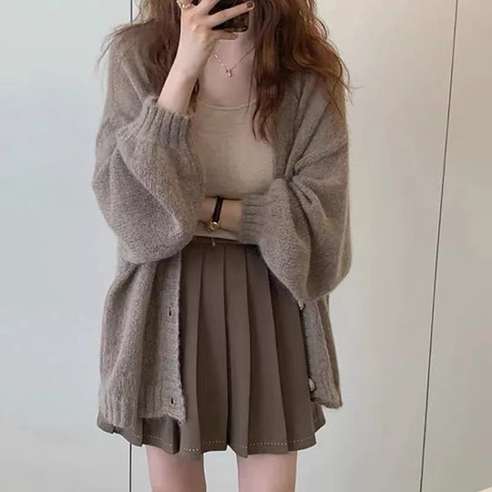 Damen Strickjacke im lässigen Oversized-Stil mit voluminösen Ärmeln und praktischen Taschen EB