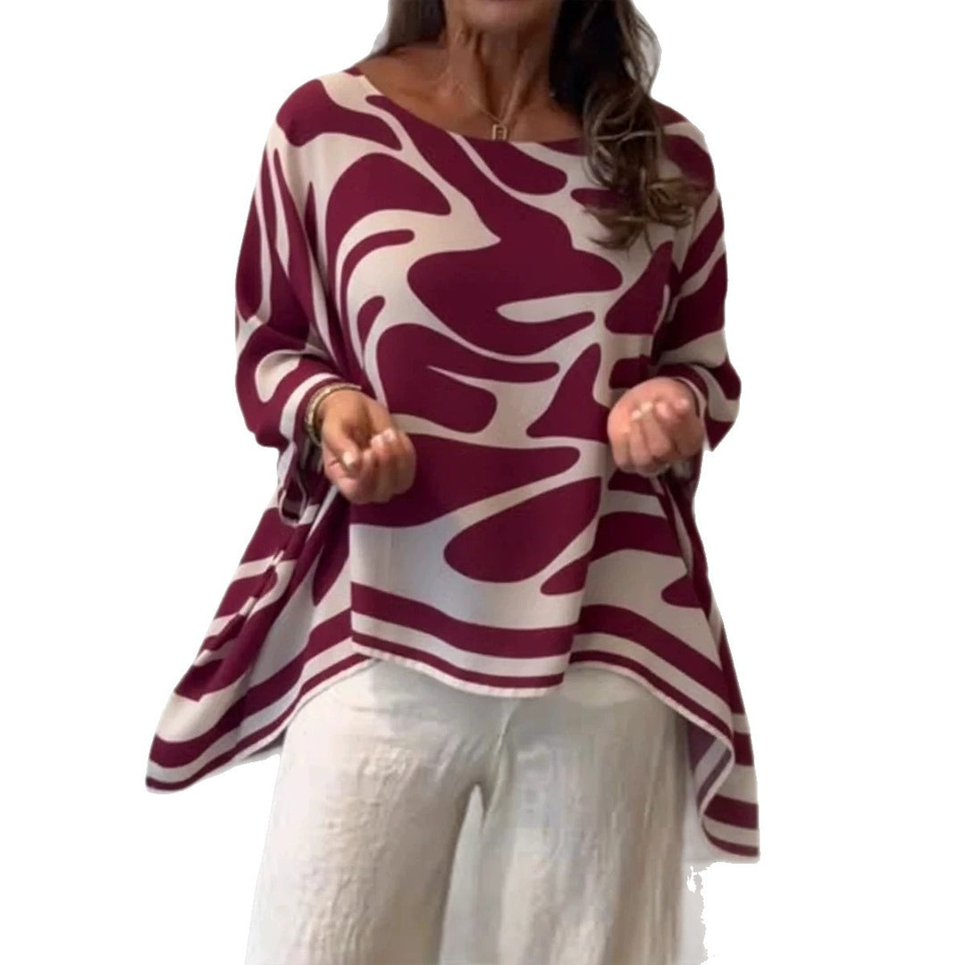 Damen Oversize Sommerbluse mit abstraktem Print, Fledermausärmeln und asymmetrischem Saum EB