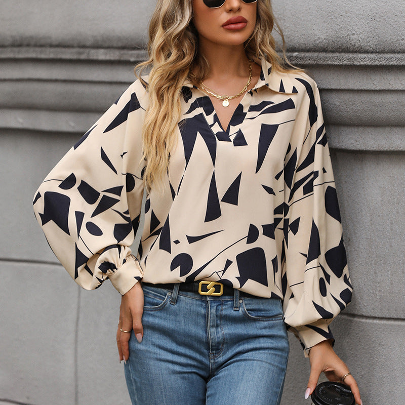 Damen Bluse mit elegantem geometrischen Design und Puffärmeln EB