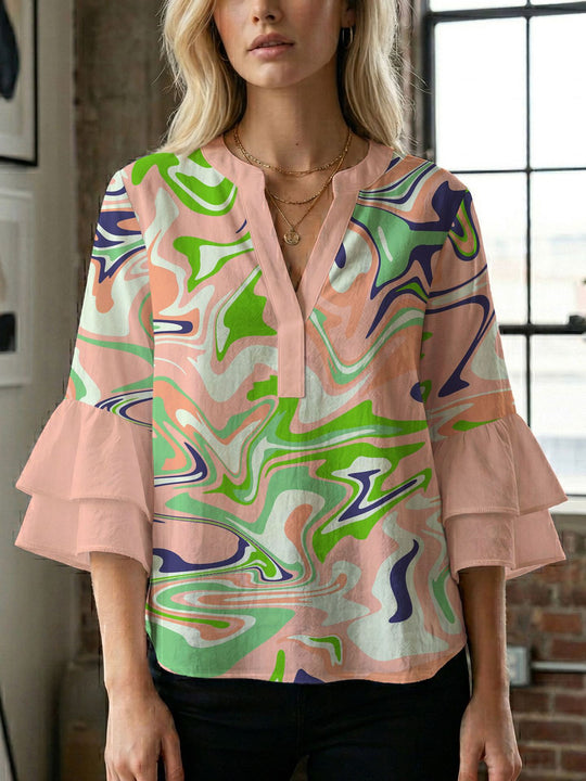 Damen Blusenshirt mit voluminösen Ärmeln und kreativem Druckdesign EB