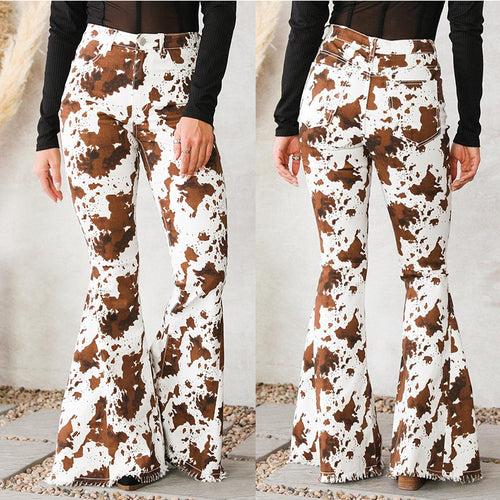 Damen Flared Jeans mit auffälligem Kuhflecken-Muster EB