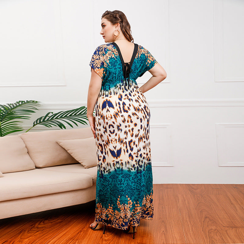 Damen Maxikleid mit elegantem Tierdruck und fließendem Schnitt EB