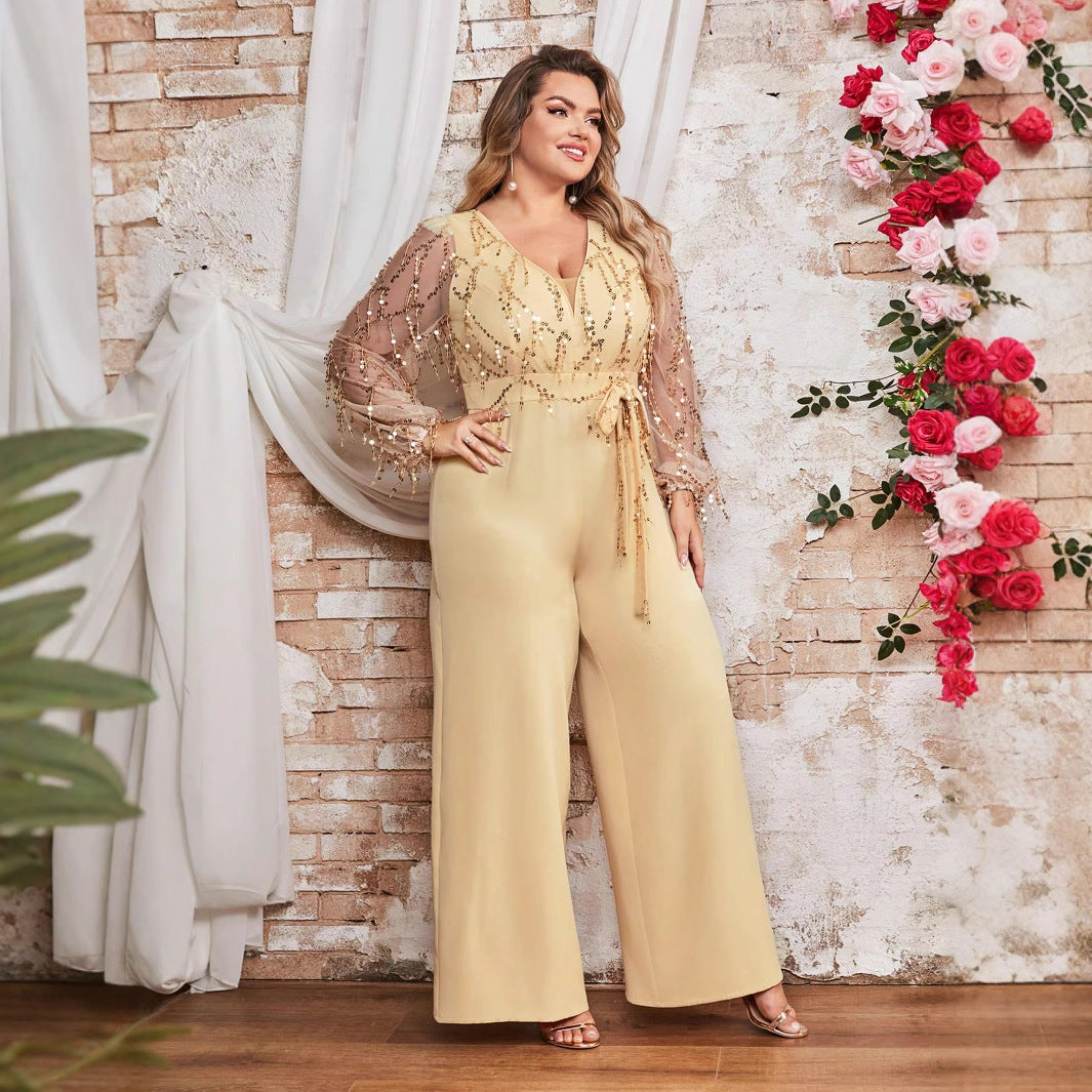 Damen Jumpsuit mit funkelnden Verzierungen und transparenten Ärmeln EB
