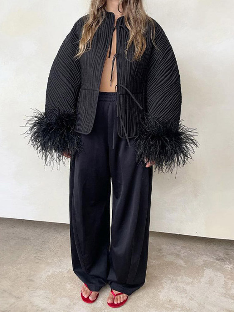 Damen trendige Steppjacke mit voluminösen Federn EB