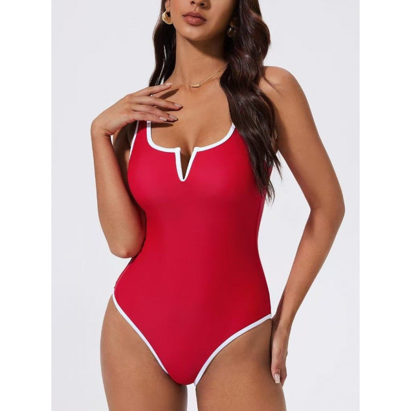 Damen Einteiliger Badeanzug mit tiefem V-Ausschnitt und kontrastierenden Details EB