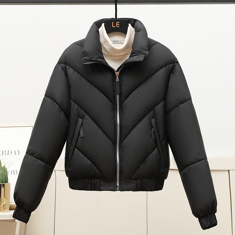 Damen Trendige und kuschelige Pufferjacke mit hohem Kragen und praktischen Eingrifftaschen EB