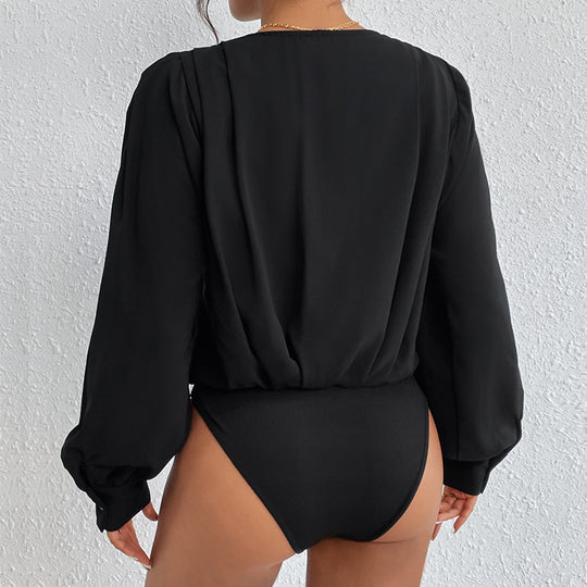Damen Wickelbluse mit V-Ausschnitt, gepufften Schultern und elastischem Saum EB