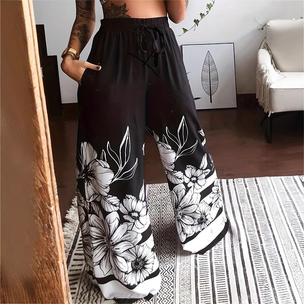 Damen Weite Palazzo-Hose mit buntem Schmetterlingsdruck und elastischem Bund EB