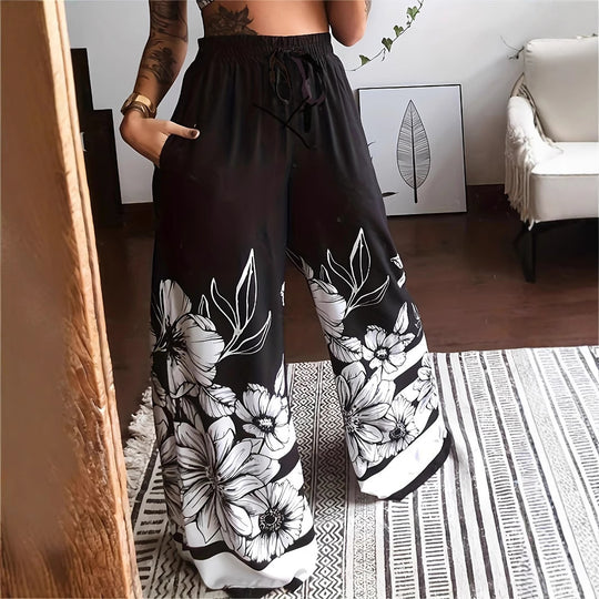 Damen Weite Palazzo-Hose mit buntem Schmetterlingsdruck und elastischem Bund EB