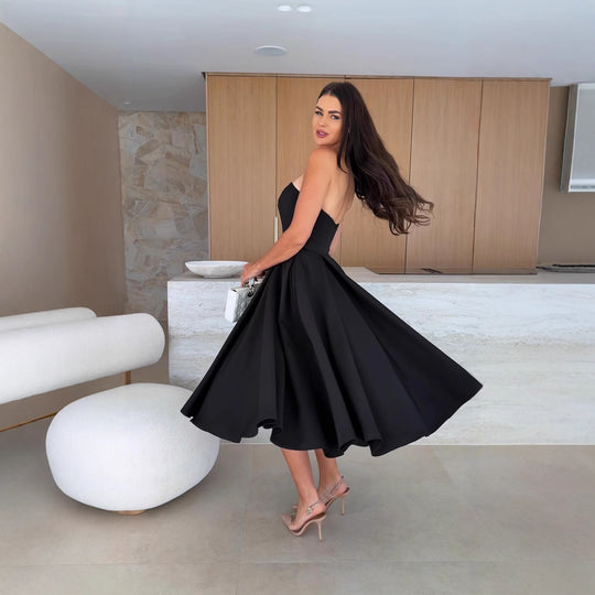 Damen A-linien Cocktailkleid mit trägerlosem Schnitt und schwingendem Rock EB