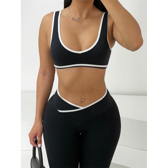 Damen Sportliches Zweiteiler Set mit kurzer Oberteil und flared Leggings EB