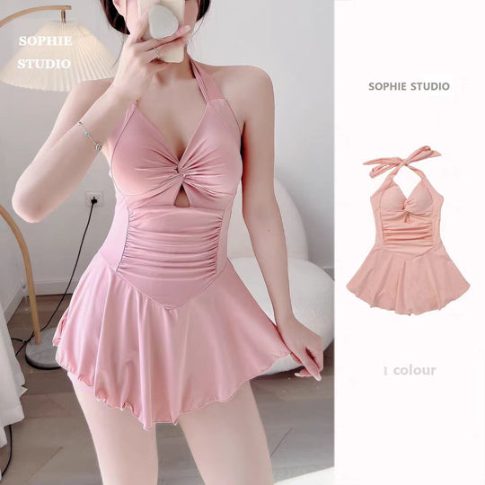 Damen Einteiler Badeanzug mit modischem Wickeldesign und geschmackvollem Cut-Out EB