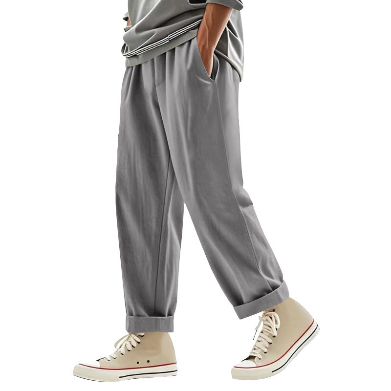 Herren nan weite Bundfalten-Chinohose mit Umschlag, konisch zulaufendem Schnitt und seitlichen Eingrifftaschen EB