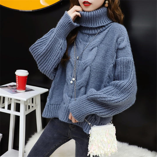 Damen Grobstrickpullover mit hohem Rollkragen und modernem Zopfmuster EB