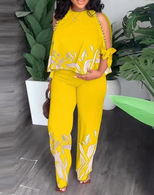 Damen Elegant gestaltetes Sommeroutfit mit floralem Design und Schulterfreiem Oberteil EB