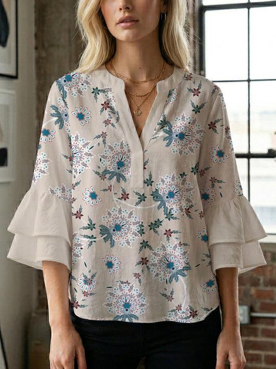 Damen Bluse mit voluminösen Ärmeln und floralem Design EB