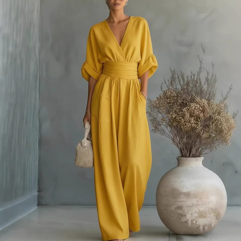 EB | Eleganter Ärmelloser Jumpsuit mit Tiefem V-Ausschnitt, Taillenbund und Weitem Bein