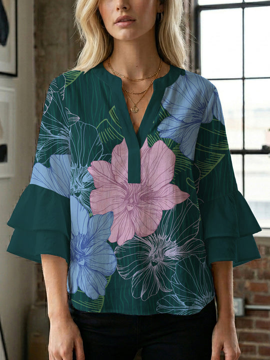 Damen Bluse mit voluminösen Ärmeln und floralem Design EB