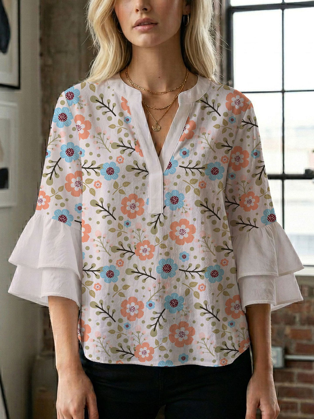 Damen Bluse mit voluminösen Flügelärmel und intensivem Blattmuster EB