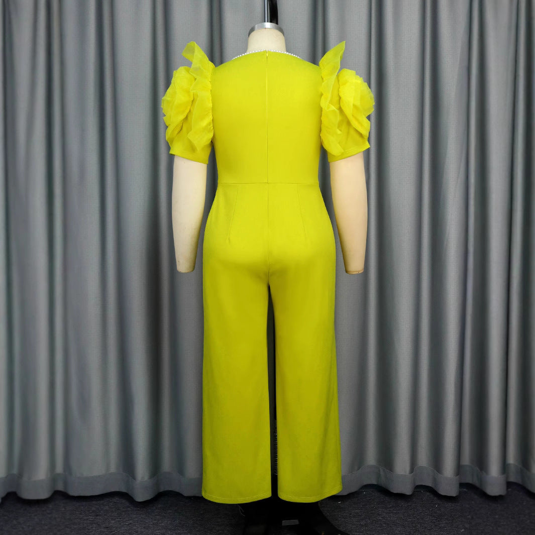 Damen eleganter Jumpsuit mit voluminösen Puffärmeln und Perlenakzent EB