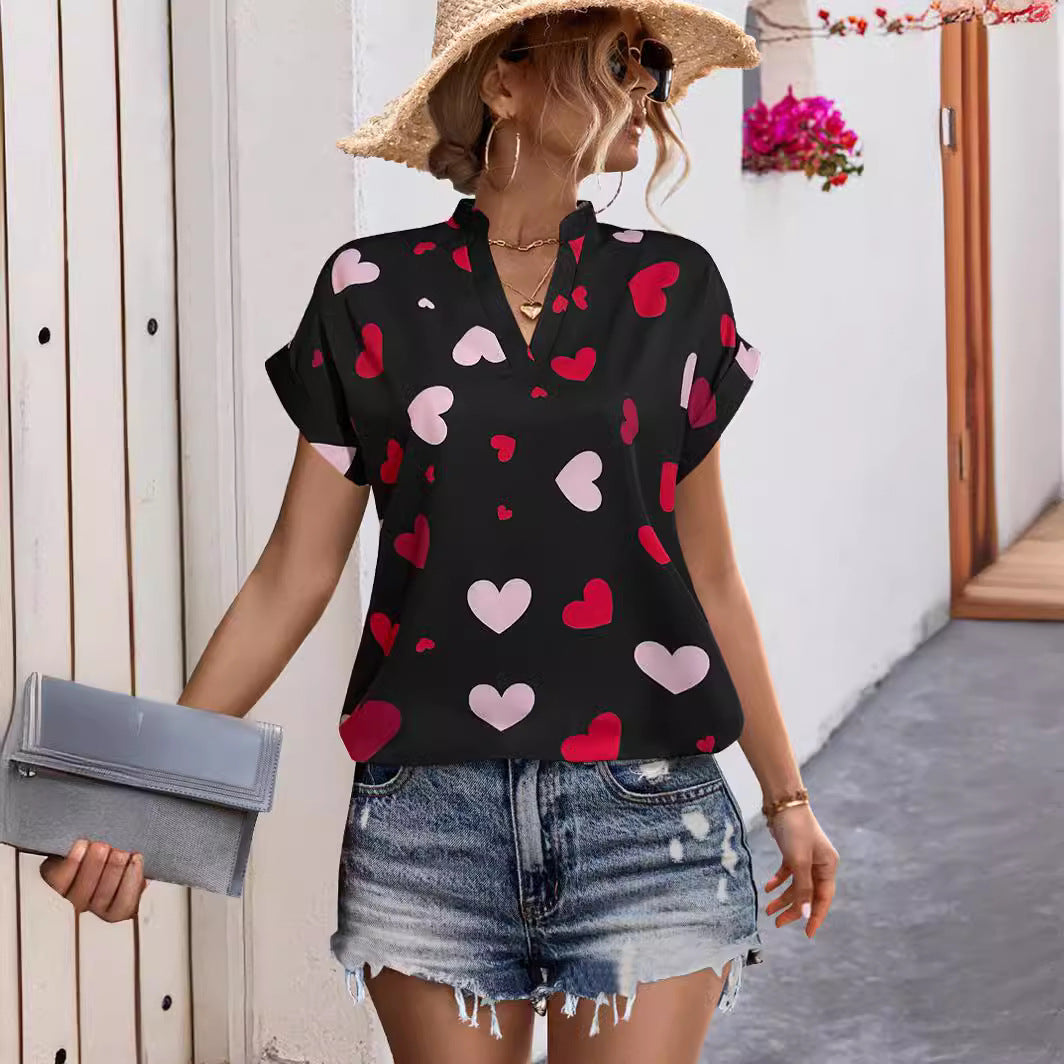 Damen luftiges Blusenshirt mit herzförmigem Print und lockerer Passform EB