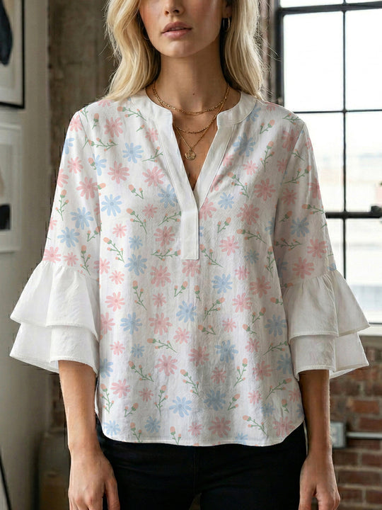 Damen Bluse mit voluminösen Flügelärmel und intensivem Blattmuster EB