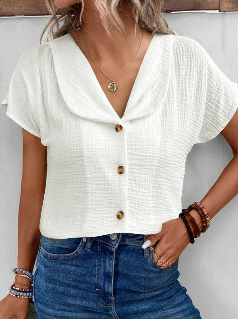 Damen Blusenshirt mit stilvollem Schalkragen und dekorativen Knopfdetails EB