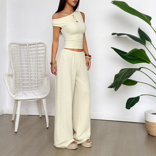 Damen Zweiteiliges Set aus elastischem Rippstoff mit asymmetrischem Top und weitem Hosen EB