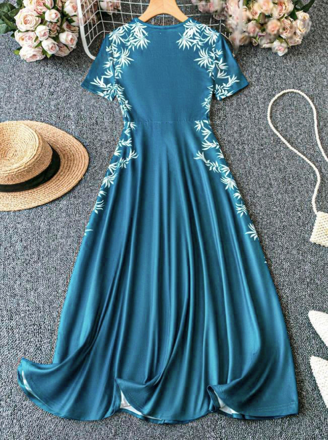 Damen Strandkleid mit floralem Design und fließendem Schnitt EB