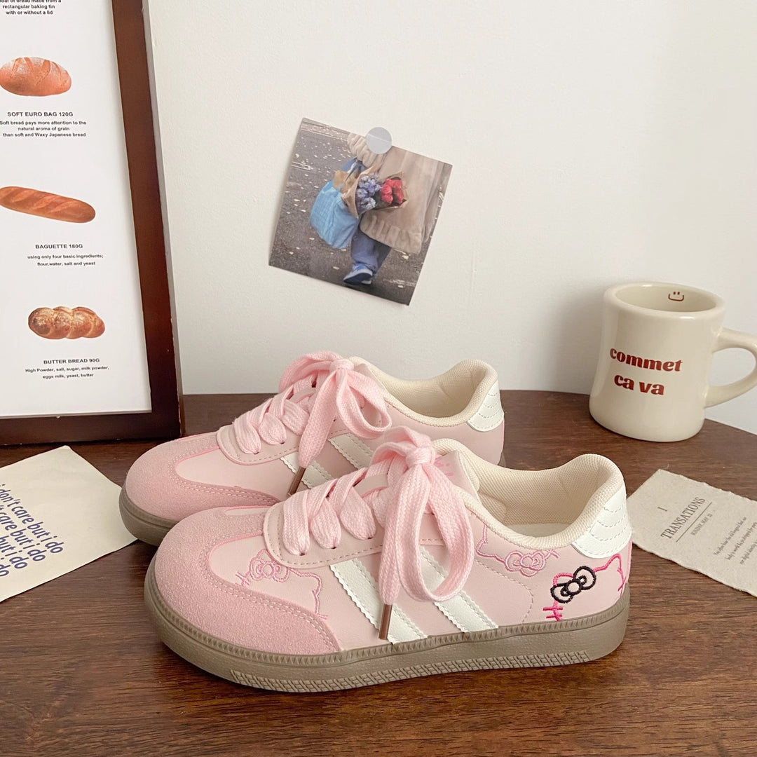 Damen Sneakers im verspielten Design mit Hello Kitty-Applikationen EB