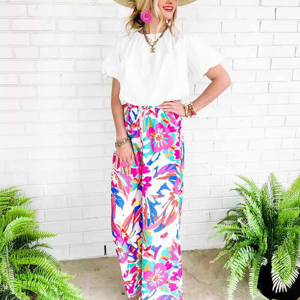 Damen weite Palazzo-Hose mit buntem Blumenmuster und elastischem Bund EB