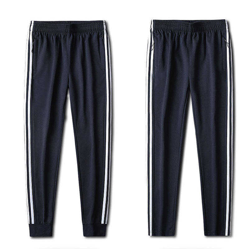 Herren Slim-Fit Trackhose mit seitlichen Kontraststreifen, Reißverschlusstaschen und elastischem Bund EB